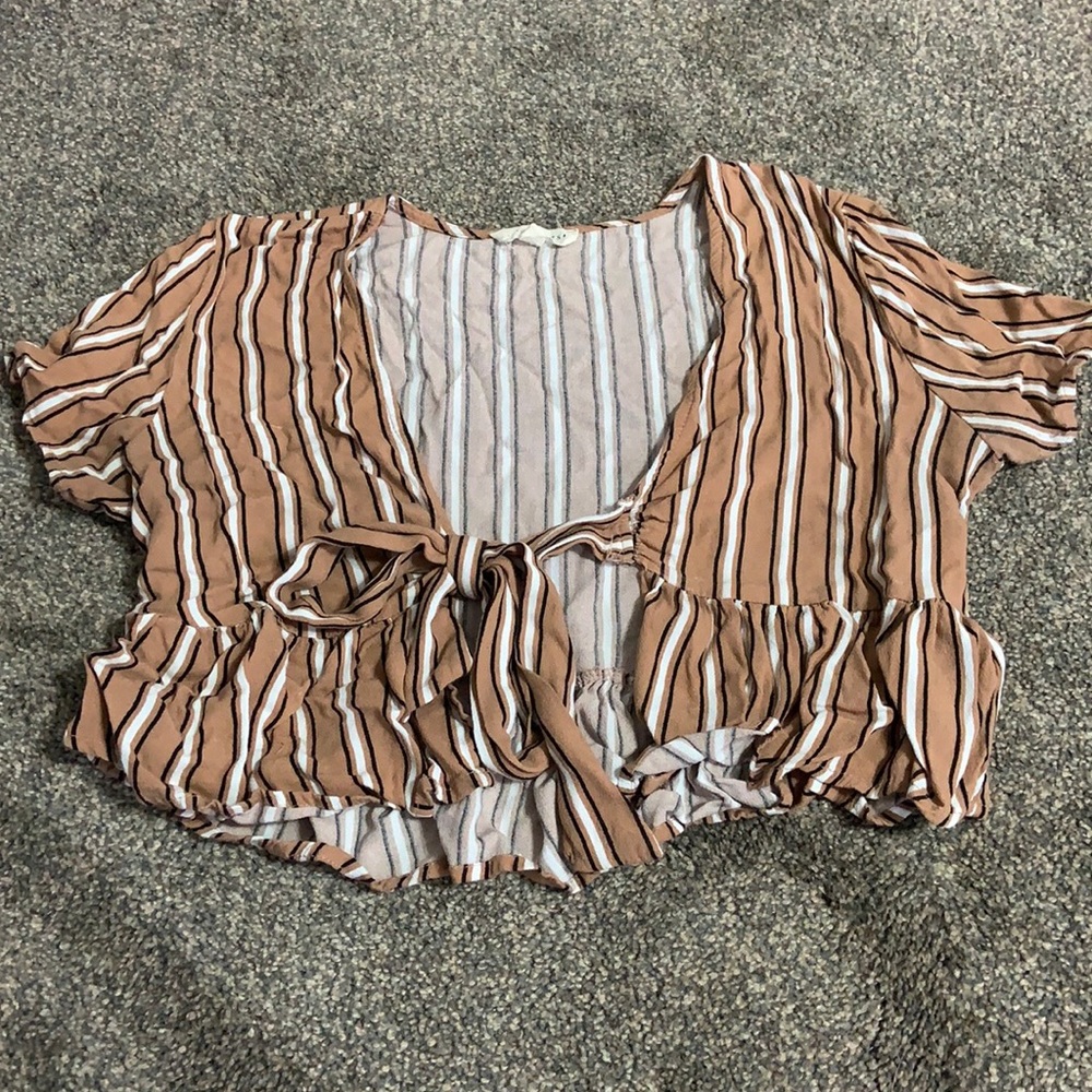 Stripped crop top best warn with a black crop top underneath
